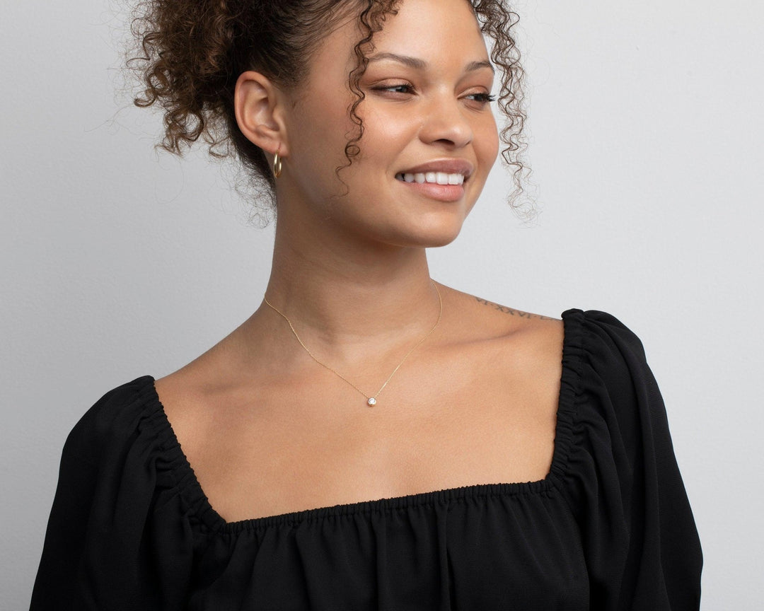 The Solitaire Pendant Necklace as an anniversary gift in 18K Gold Vermeil. Tarnish-resistant, made for keeping.