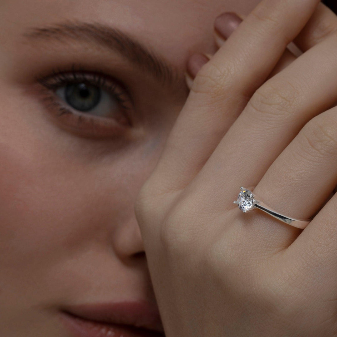 The Solitaire Promise Ring as an anniversary gift in 18K Gold Vermeil. Tarnish-resistant, made for keeping.