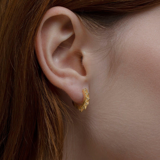 Close detail of the Spike Huggie Earring in 18K Gold Vermeil. Tarnish-resistant, premium handmade jewelry.