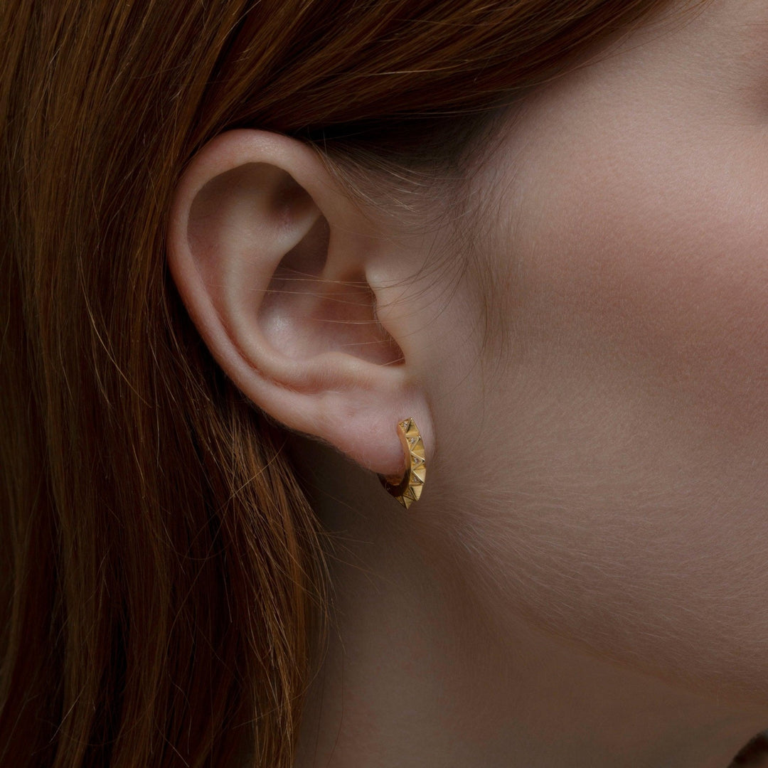 The Spike Huggie Earring as a graduation gift in 18K Gold Vermeil. Tarnish-resistant, made for keeping.