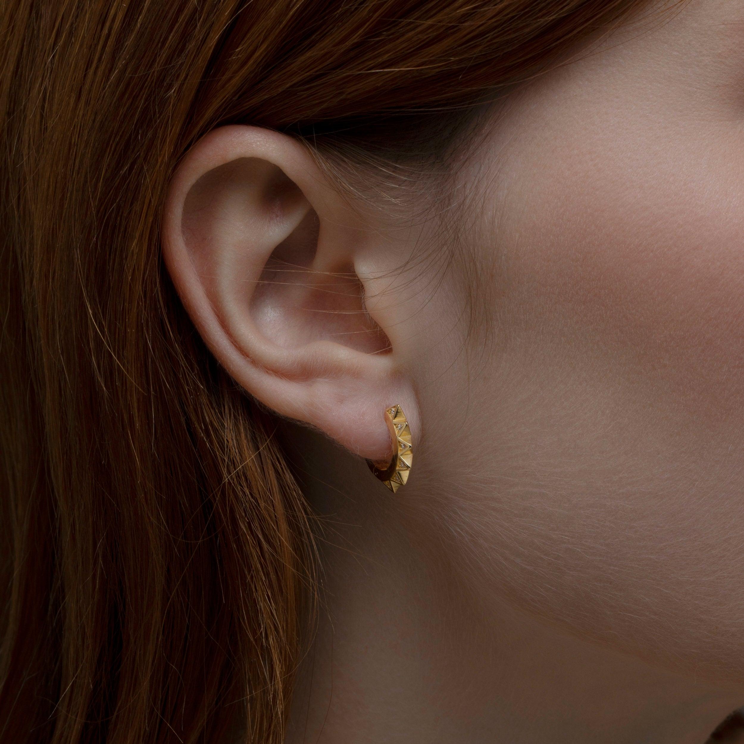 The Spike Huggie Earring as a graduation gift in 18K Gold Vermeil. Tarnish-resistant, made for keeping.