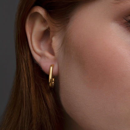The Square Hinged Hoops styled in 18K Gold Vermeil — elegant everyday jewelry. Hypoallergenic for sensitive ears.