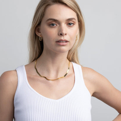 The Square Hoop Earrings with Baguette Diamond styled in 18K Gold Vermeil — elegant everyday jewelry. Hypoallergenic.