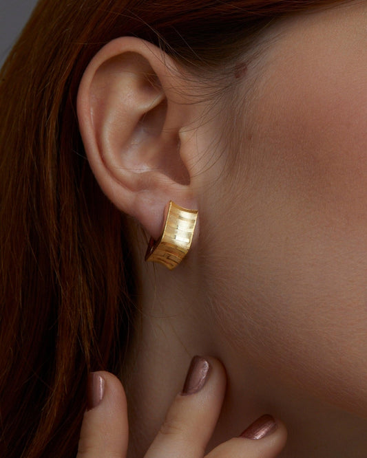 Close detail of the Square Hoop Huggie Earrings in 18K Gold Vermeil. Tarnish-resistant, premium handmade jewelry.