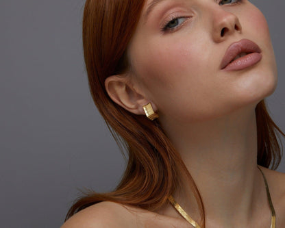 Macro detail of the Square Hoop Huggie Earrings showcasing craftsmanship in 18K Gold Vermeil. No green marks, handmade.