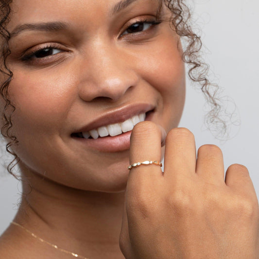 Close detail of the Stackable Band with CZ Stones in 18K Gold Vermeil with CZ Diamond. Hypoallergenic, no green marks.