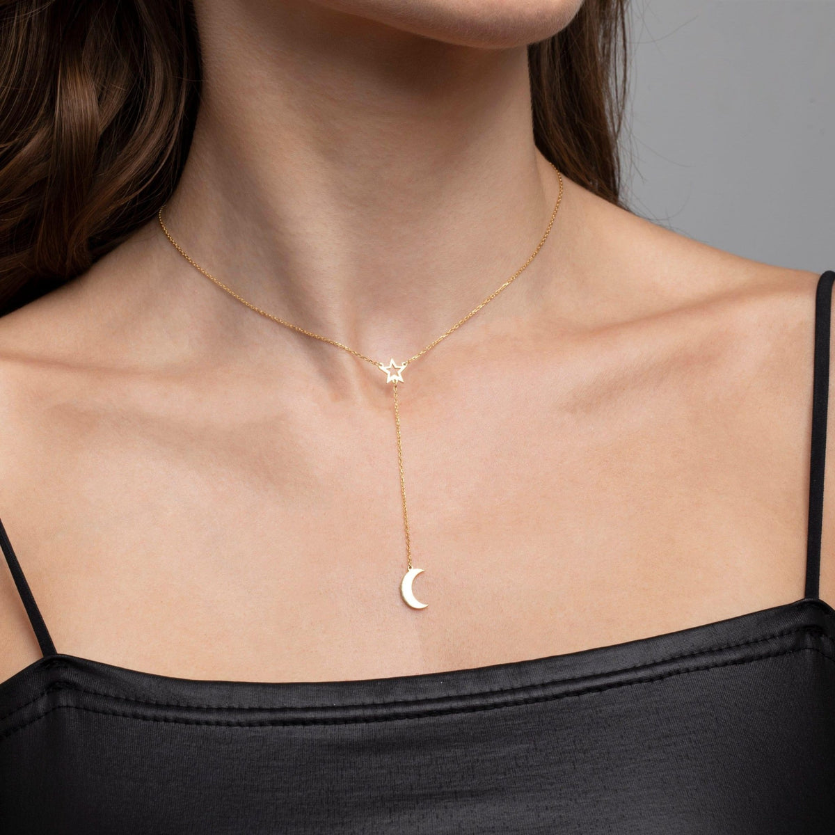 Close detail of the Star and Moon Necklace in 18K Gold Vermeil. Safe for sensitive skin, premium handmade jewelry.