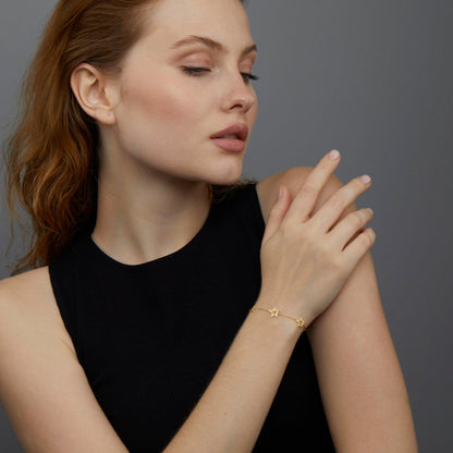 The Star Bracelet styled in 18K Gold Vermeil — elegant everyday jewelry. Hypoallergenic, no green marks.