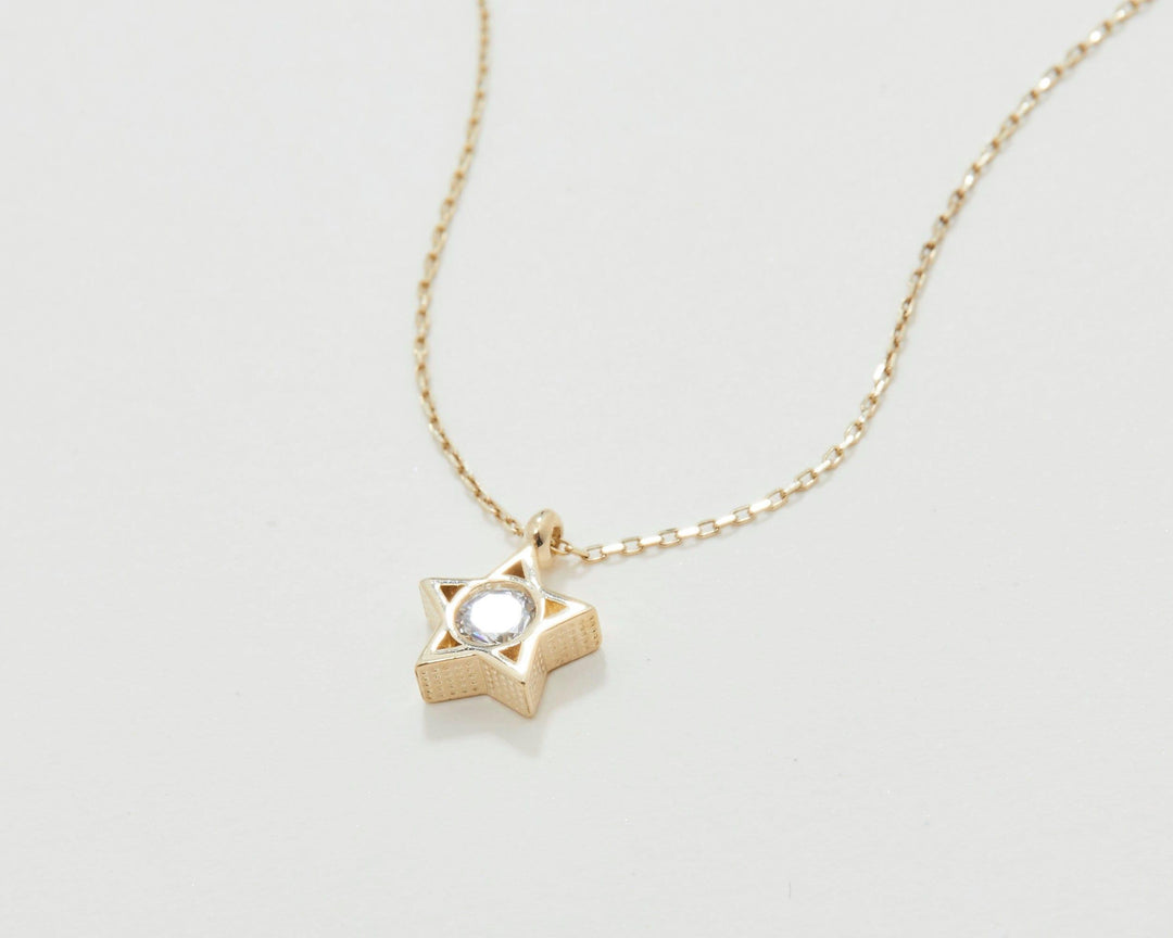 The Star Diamond Necklace styled in 18K Gold Vermeil — elegant everyday jewelry. Hypoallergenic, no green marks.