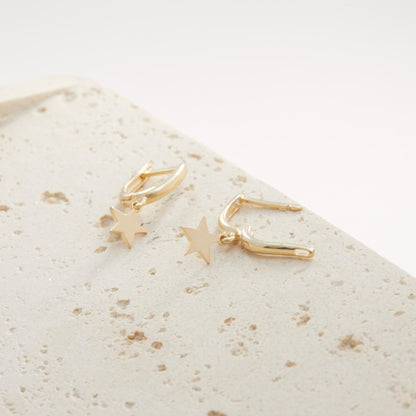 The Star Hoop Earrings worn in 18K Gold Vermeil — refined accessory for women. Tarnish-resistant.
