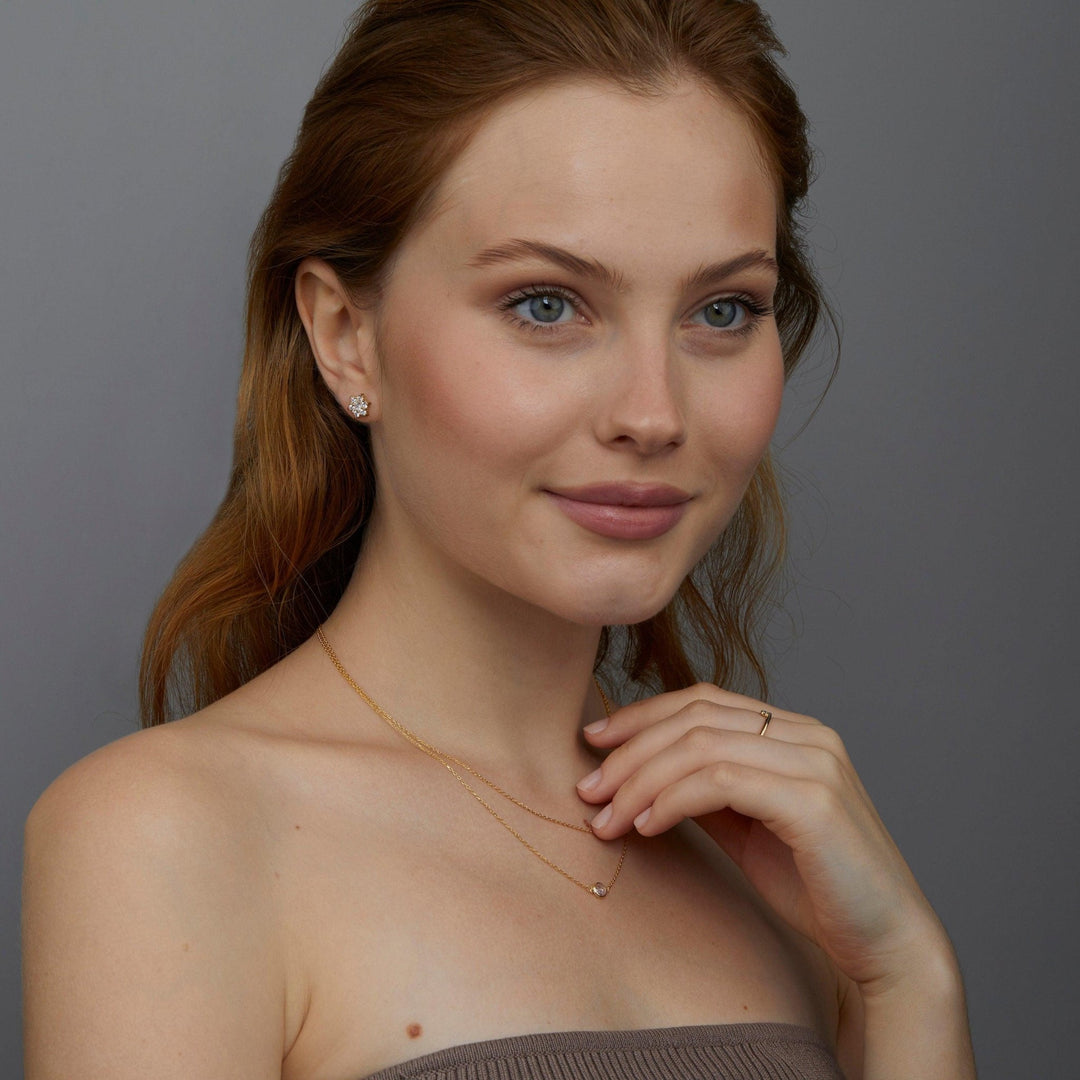 The Star of David Stud Earrings styled in 18K Gold Vermeil — elegant everyday jewelry. Hypoallergenic for sensitive ears.