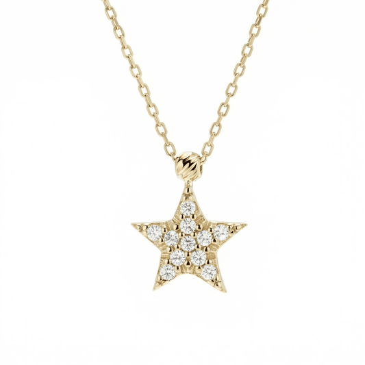 Star Pavé Necklace in 14K solid gold: a small star set with 11 clear CZ stones on a fine chain.