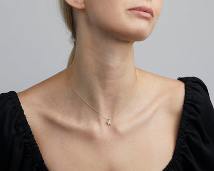 Close detail of the Star Pavé Necklace in 18K Gold Vermeil with CZ Diamond. Hypoallergenic, no green marks, premium.