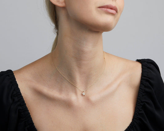 Close detail of the Star Pavé Necklace in 18K Gold Vermeil with CZ Diamond. Hypoallergenic, no green marks, premium.