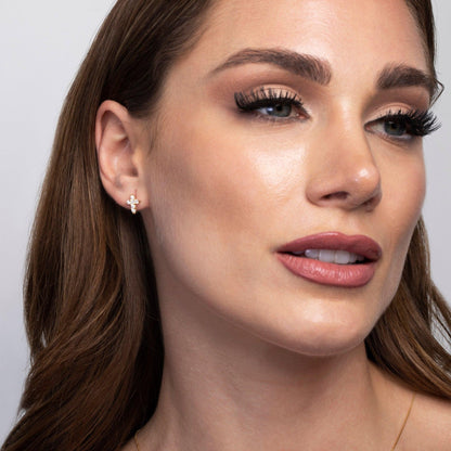 The Sterling Silver Diamond Cross Stud Earrings styled in 18K Gold Vermeil — elegant everyday jewelry. Hypoallergenic.