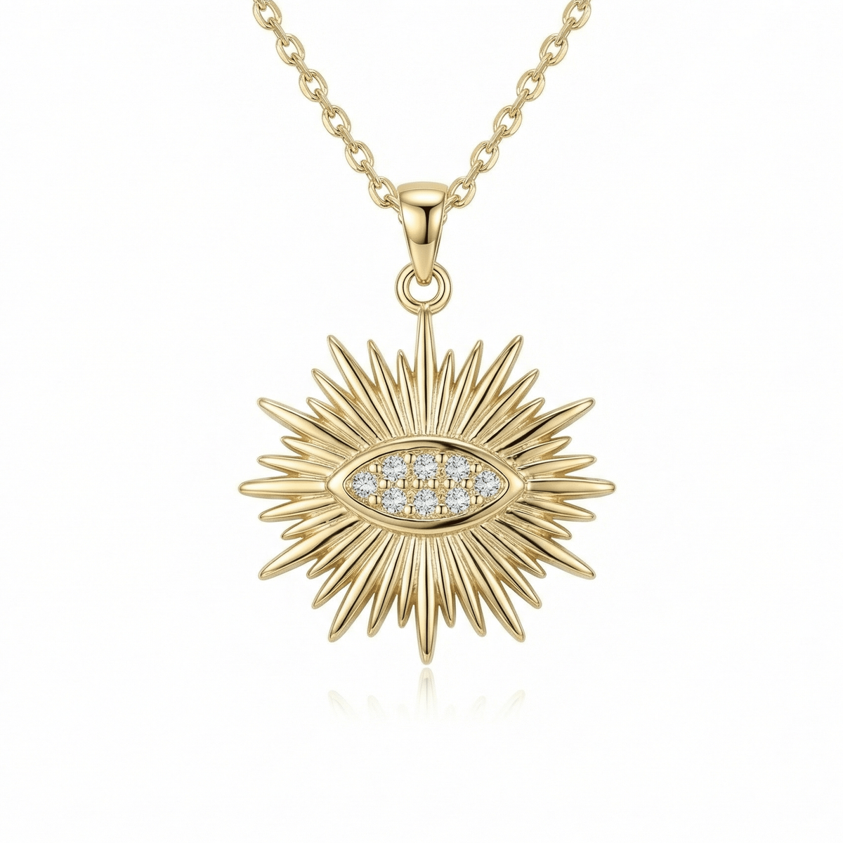 Sun Evil Eye Necklace in 14K solid gold: a sunburst pendant with eight CZ stones set in an almond-shaped eye at its center.