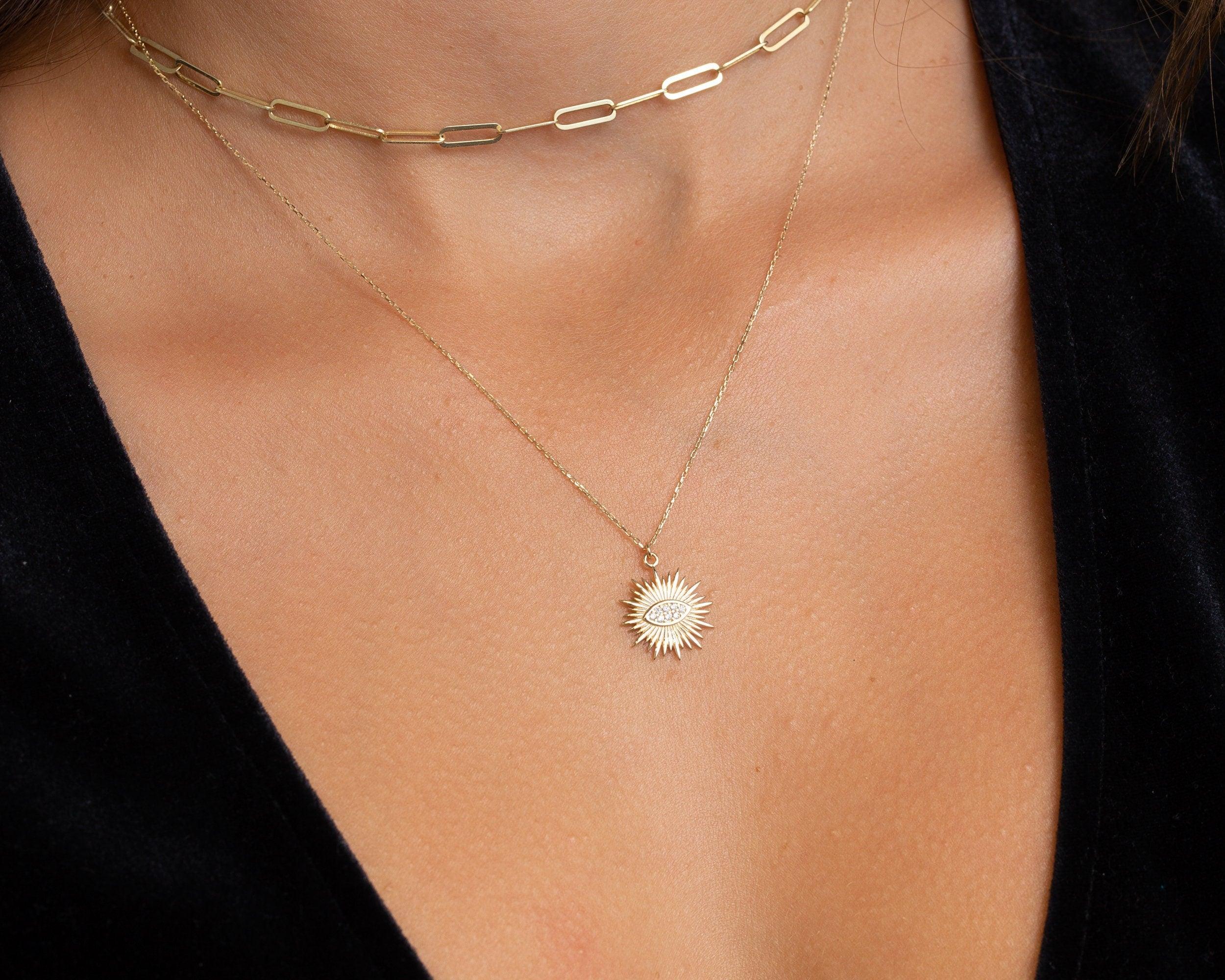 Close detail of the Sun Evil Eye Necklace in 18K Gold Vermeil. Safe for sensitive skin, premium handmade jewelry.