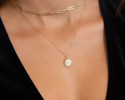 Close detail of the Sun Evil Eye Necklace in 18K Gold Vermeil. Safe for sensitive skin, premium handmade jewelry.