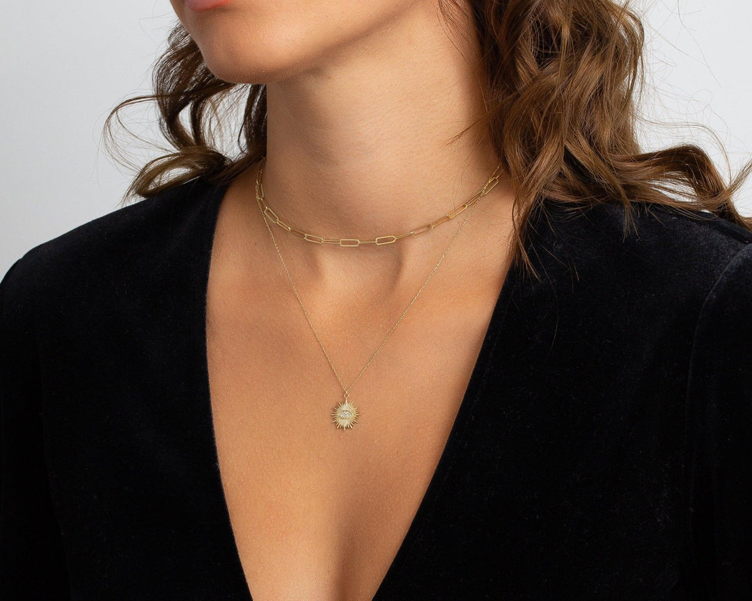 The Sun Evil Eye Necklace as a graduation gift in 18K Gold Vermeil. Safe for sensitive skin, made for keeping.