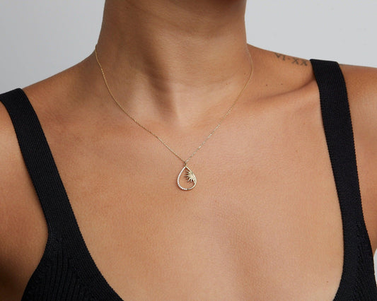 Close detail of the Sun Necklace in 18K Gold Vermeil. Safe for sensitive skin, premium handmade jewelry.