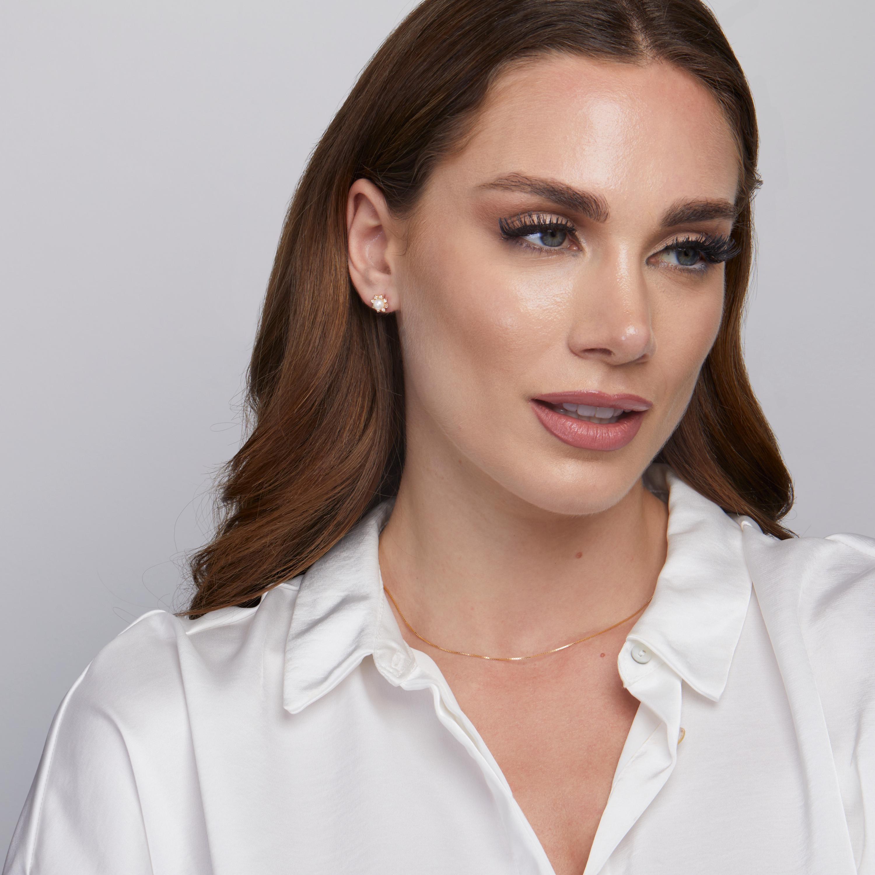The Sun Pearl Stud Earrings styled in 18K Gold Vermeil — elegant everyday jewelry. Hypoallergenic for sensitive ears.