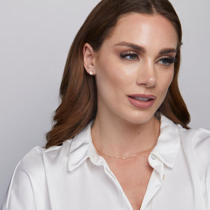 The Sun Pearl Stud Earrings styled in 18K Gold Vermeil — elegant everyday jewelry. Hypoallergenic for sensitive ears.