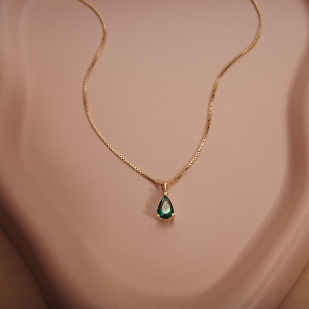 Macro detail of the Teardrop Birthstone Necklace: Birthstone set in 18K Gold Vermeil. Tarnish-resistant, handmade jewelry.