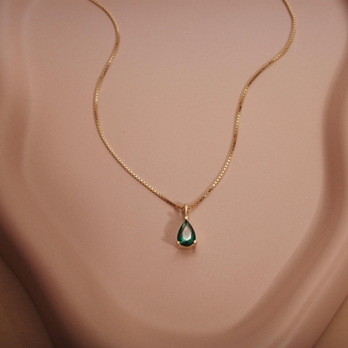 Macro detail of the Teardrop Birthstone Necklace: Birthstone set in 18K Gold Vermeil. Tarnish-resistant, handmade jewelry.