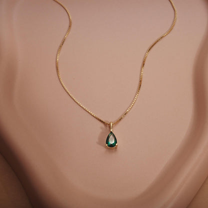 Macro detail of the Teardrop Birthstone Necklace: Birthstone set in 18K Gold Vermeil. Tarnish-resistant, handmade jewelry.