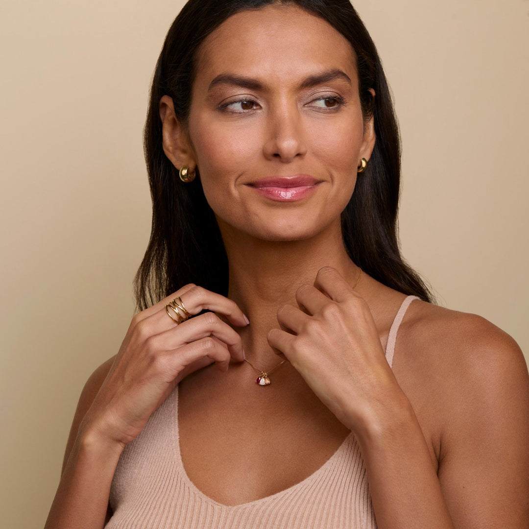 Teardrop Birthstone Necklace styled with complementary pieces in 18K Gold Vermeil. Hypoallergenic, no green marks, layered.