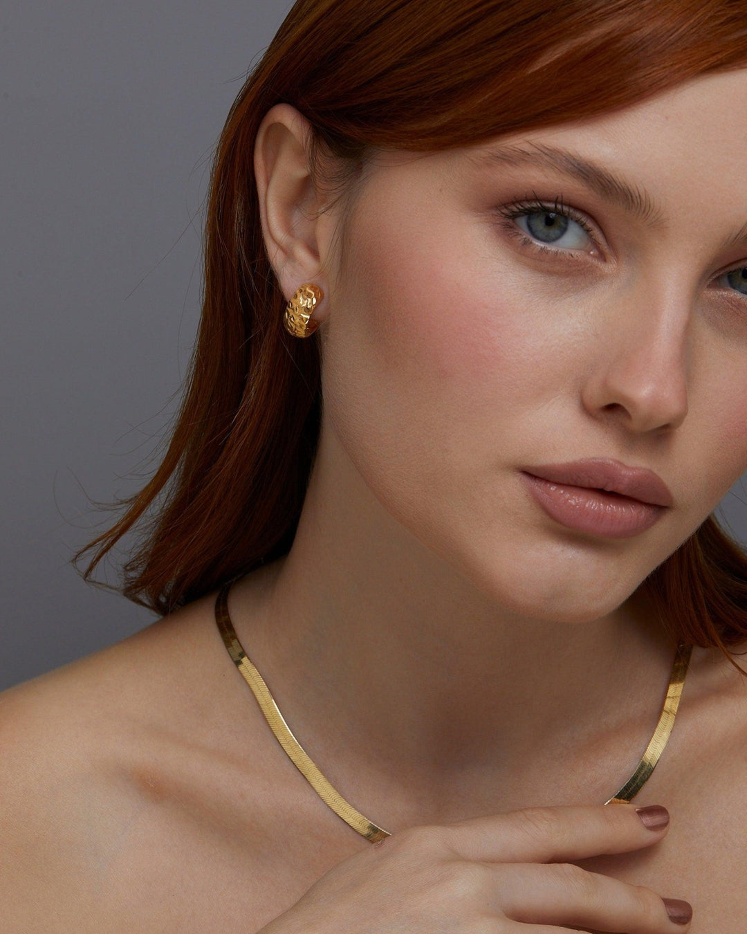 The Textured Hinged Huggie Hoop Earrings as a graduation gift in 18K Gold Vermeil. Tarnish-resistant, made for keeping.