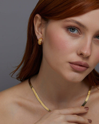 The Textured Hinged Huggie Hoop Earrings as a graduation gift in 18K Gold Vermeil. Tarnish-resistant, made for keeping.