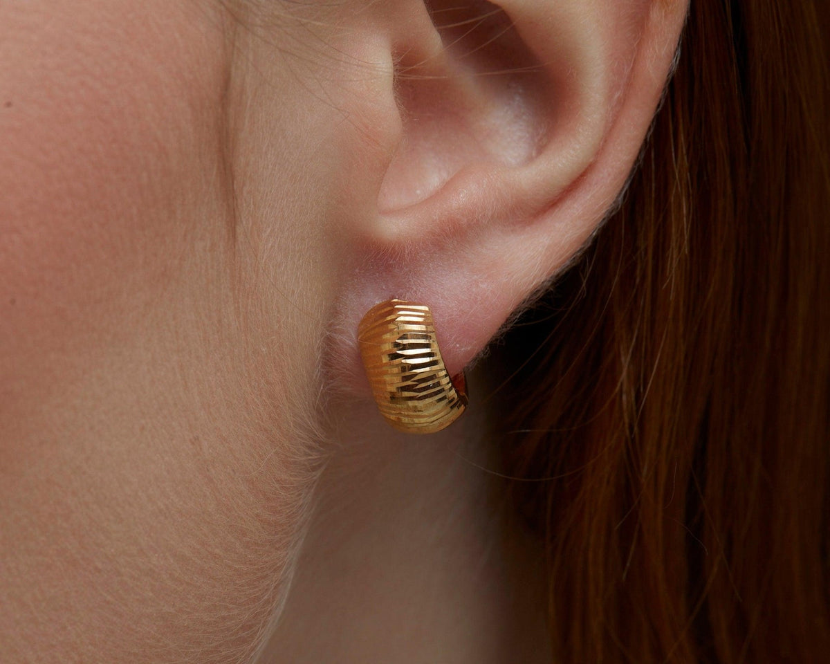 Close detail of the Textured Huggie Earrings in 18K Gold Vermeil. Tarnish-resistant, premium handmade jewelry.