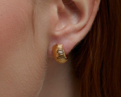 Close detail of the Textured Huggie Earrings in 18K Gold Vermeil. Tarnish-resistant, premium handmade jewelry.
