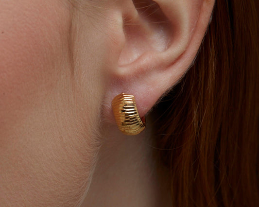 Close detail of the Textured Huggie Earrings in 18K Gold Vermeil. Tarnish-resistant, premium handmade jewelry.