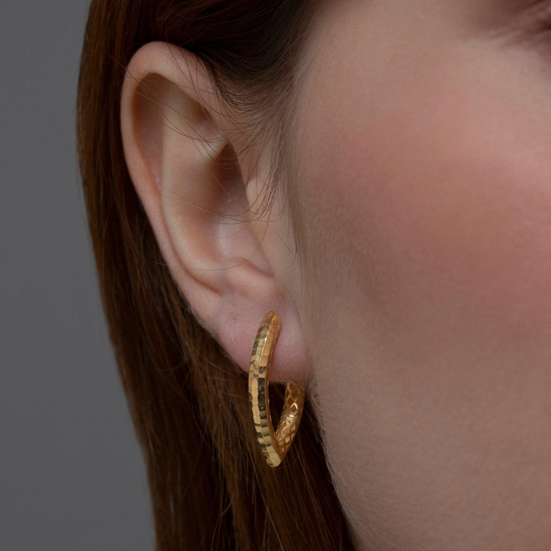 The Textured Statement Hoop Earring styled in 18K Gold Vermeil — elegant everyday jewelry. Hypoallergenic for sensitive ears.