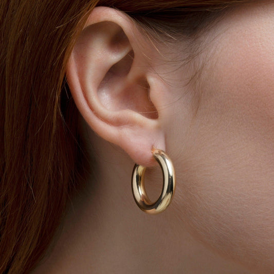 Close detail of the Thick Hoop Earrings in 18K Gold Vermeil. Tarnish-resistant, premium handmade jewelry.