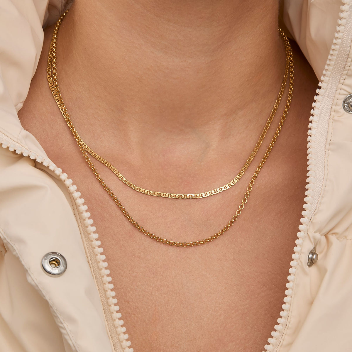 Traversino chain layering necklace styled with other gold chains