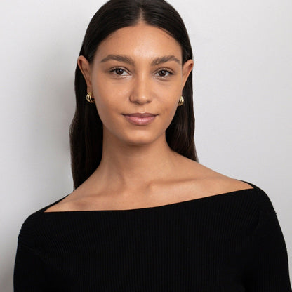 The Gold Triple Hoop Earrings as an anniversary gift in Gold-Plated Steel. Tarnish-resistant, made for keeping.