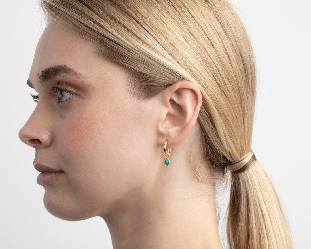 The Turquoise Drop Hoop Earrings as a daily wear gift in 18K Gold Vermeil. Tarnish-resistant, made for keeping.