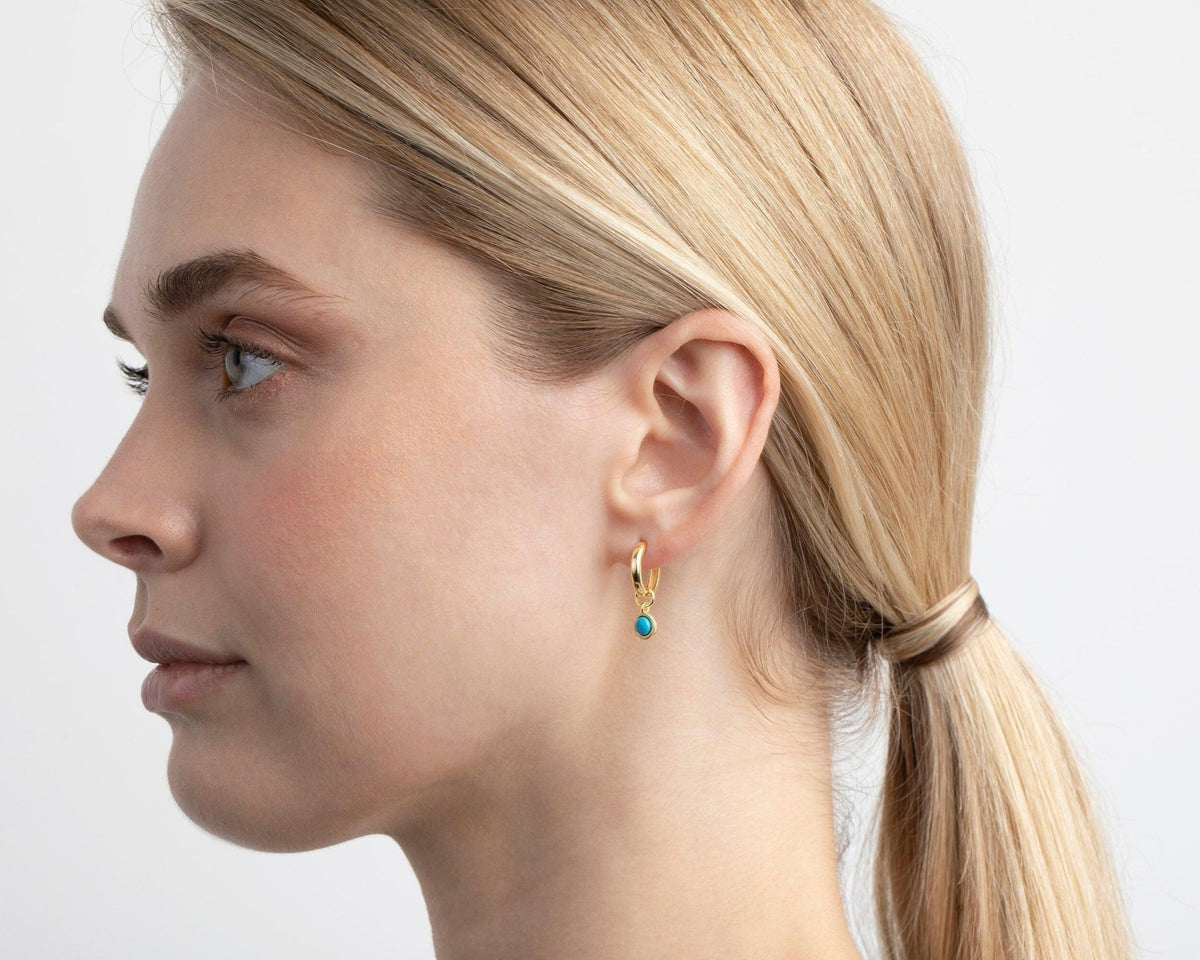 The Turquoise Drop Hoop Earrings as a daily wear gift in 18K Gold Vermeil. Tarnish-resistant, made for keeping.