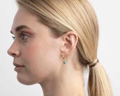 The Turquoise Drop Hoop Earrings as a daily wear gift in 18K Gold Vermeil. Tarnish-resistant, made for keeping.