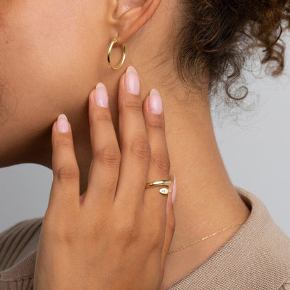 The Wrap Around Ring styled in 18K Gold Vermeil — elegant everyday jewelry. Tarnish-resistant.